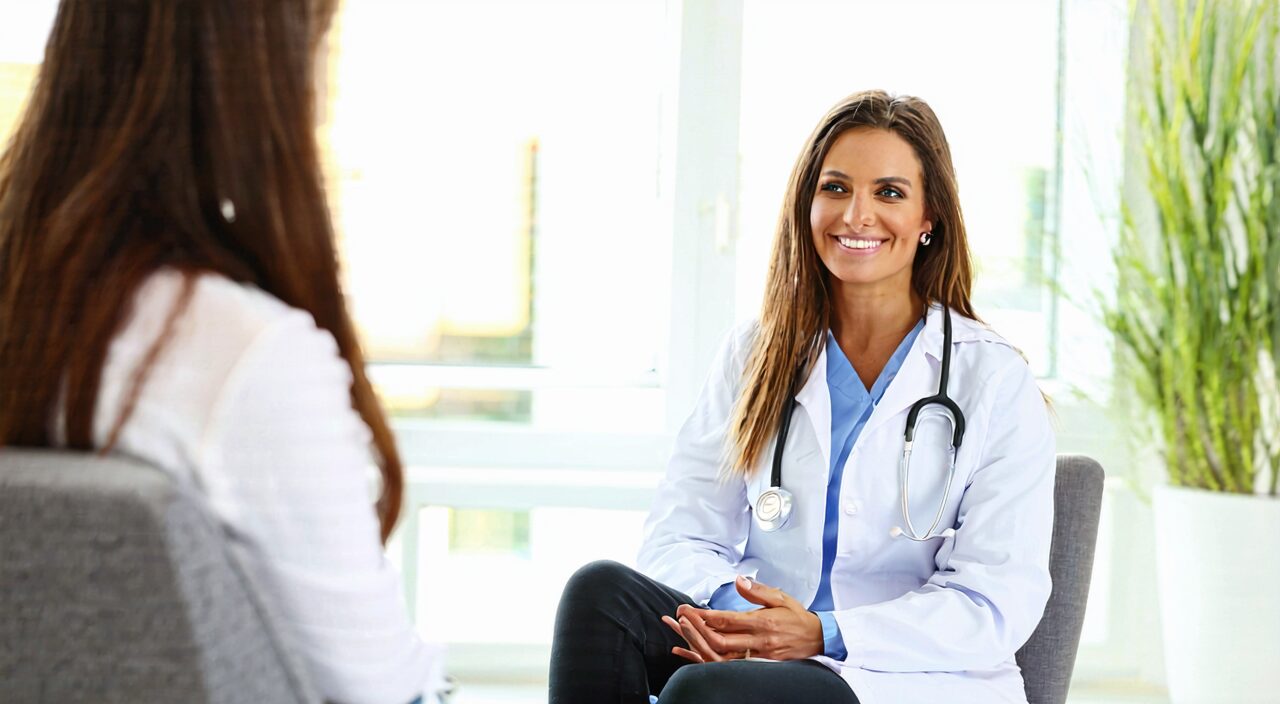 Woman consulting with doctor in clinic, emphasizing professional judgment