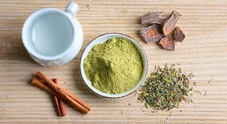 Illustration of Wuling Powder formula, showing the herbs and powder form of a classic diuretic formula.