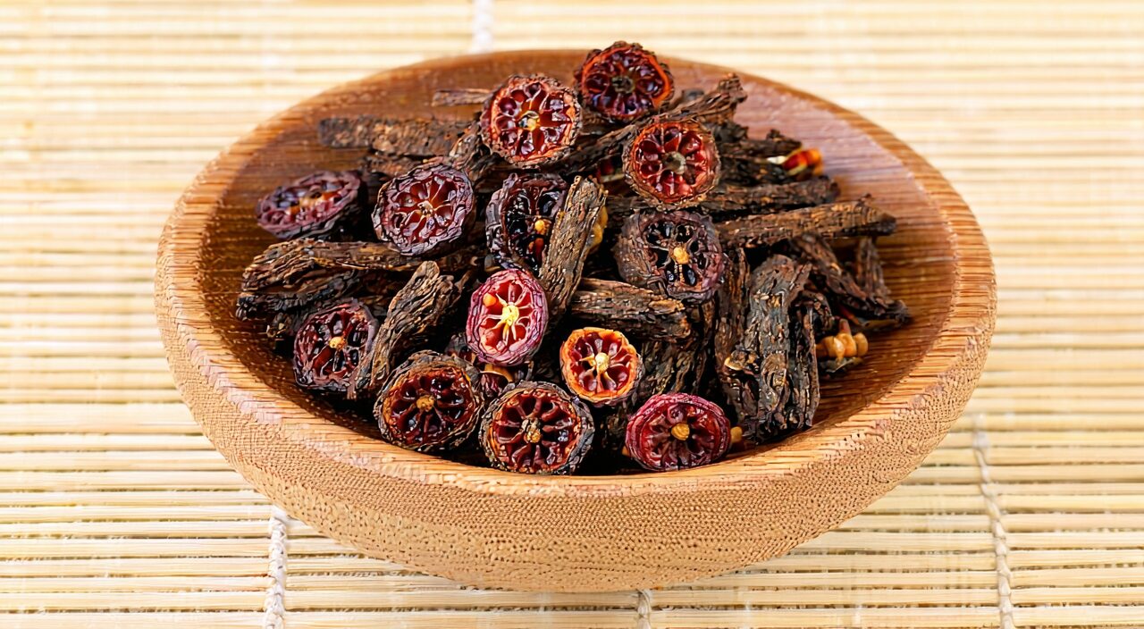 Close-up of dried schisandra fruit and cross-section